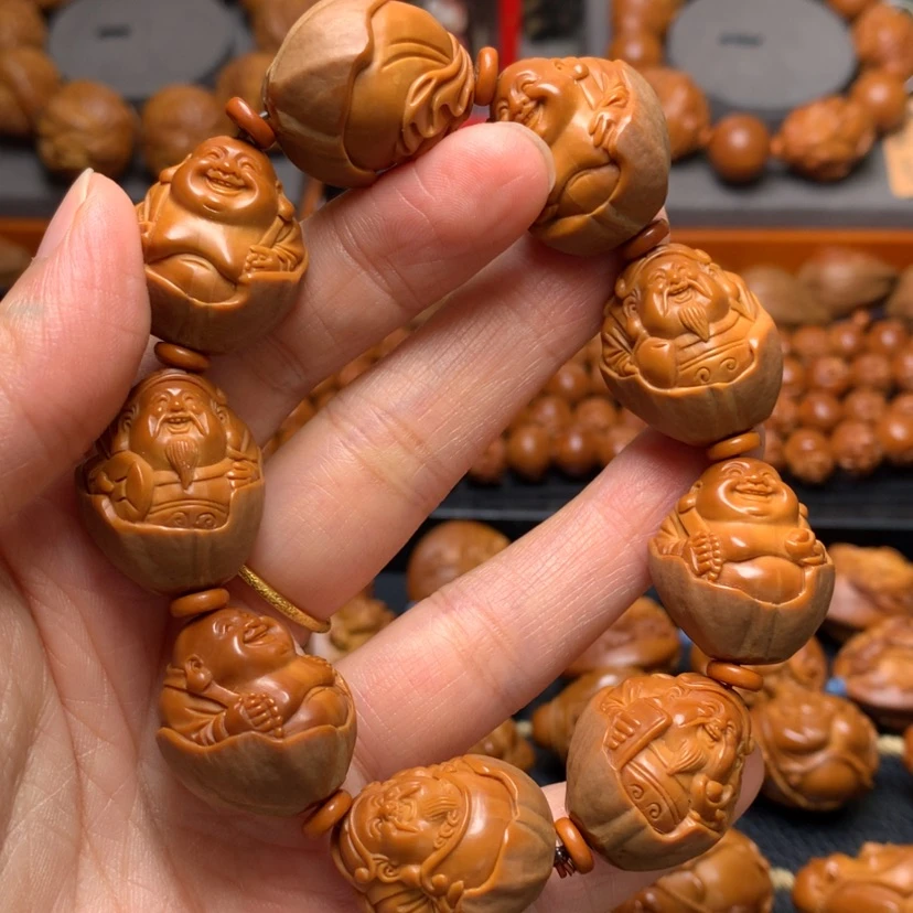 【闪购商品】橄榄核核雕向**光包衣和气生财