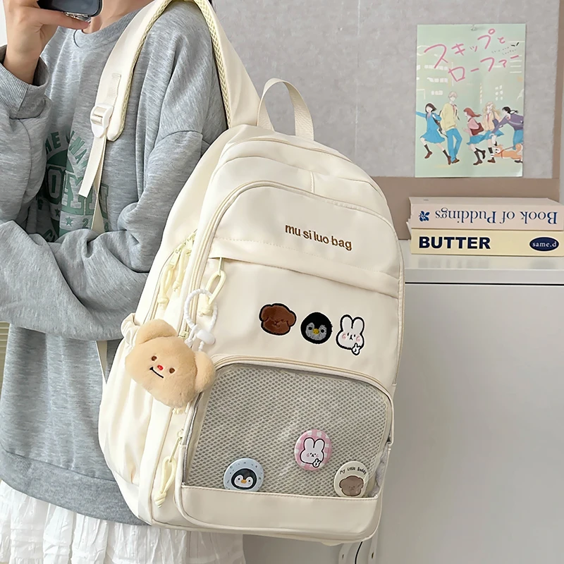 书包女生大学生百搭高中大容量初中生背包小学生字母双肩包包697