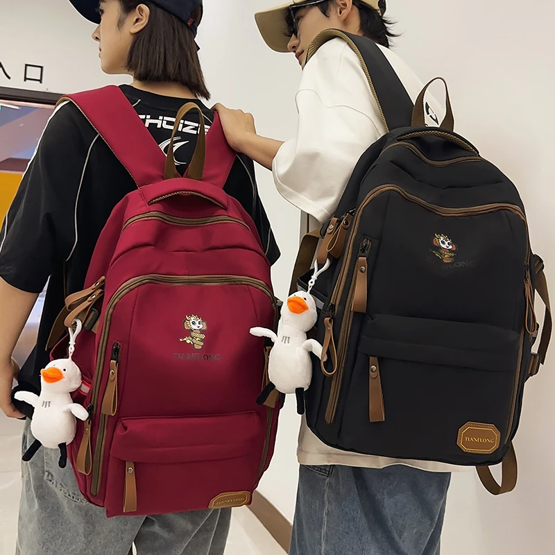 书包女生大学生百搭男款初中生高中上课背包多层大容量双肩包9048