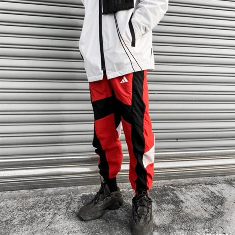 Adidas/阿迪达斯春上新男款休闲宽松系绳拼接运动束脚裤FI4685