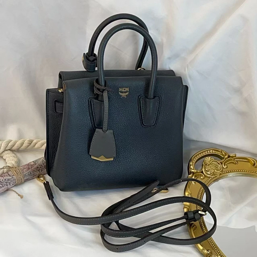 95新 MCM 聪聪/mcm黑色手提包/95新