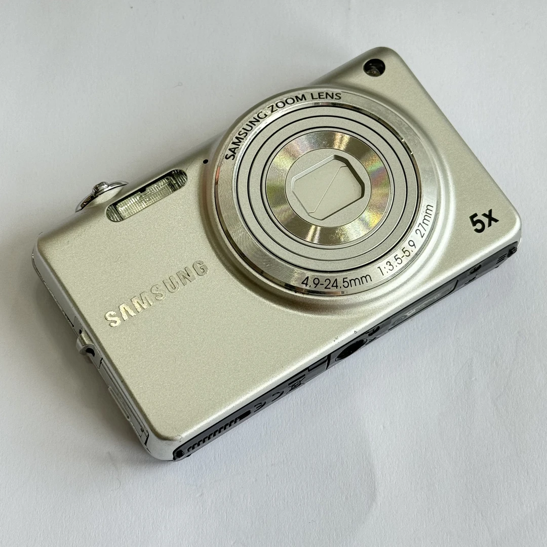 95新 Samsung/三星 st65银色1420w像素5倍光学变焦复古ccd相机