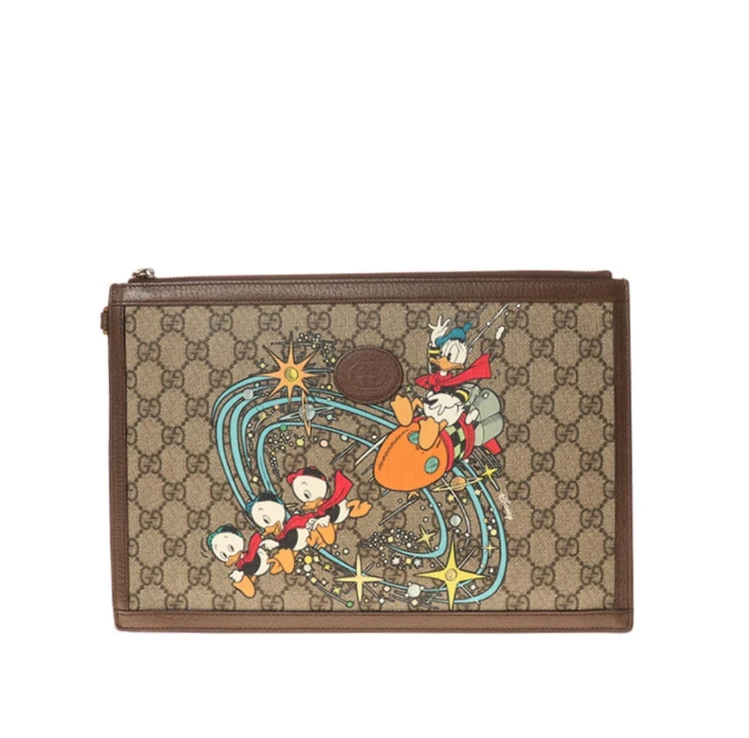 95新 GUCCI/古驰 GUCCI/古驰 唐老鸭印花手拿包 12648