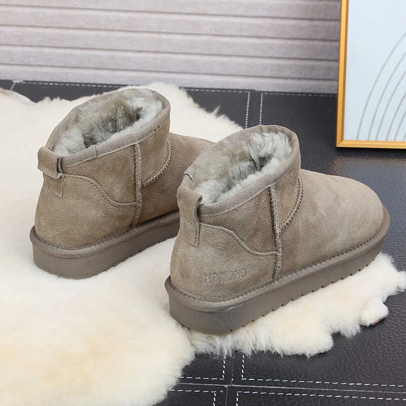 周冬雨同款雪地靴女冬牛皮羊毛加绒加厚保暖平底短筒东北低帮棉鞋