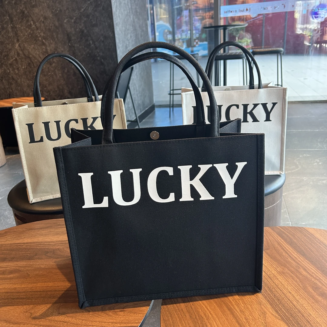 韩版时尚托特包大容量手提帆布包女休闲妈咪包通勤购物袋大包包女