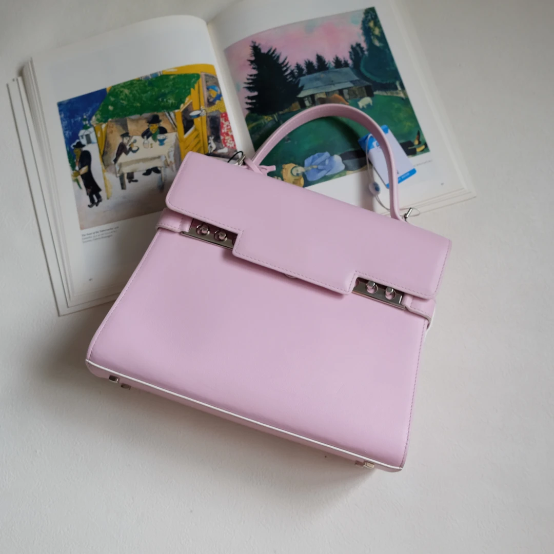 95新 Delvaux/德尔沃 98新/辣辣/樱花粉航海家中号手提斜挎包