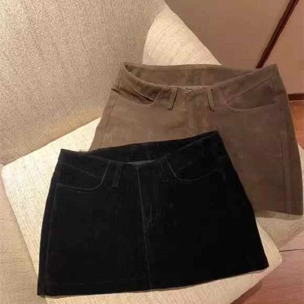 时尚设计感鹿皮绒弧形腰短裙自带安全裤女高腰显瘦显腿长半身裙