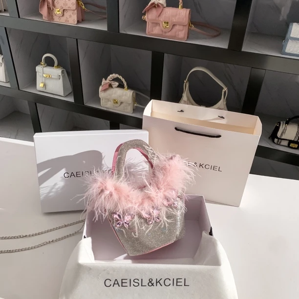 CAEISL&KCIEL小众高级感鹅毛镶钻晚宴包包女媛风手提斜挎单肩包