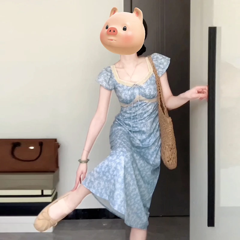 4562复古蕾丝拼接碎花连衣裙子女茶歇法式气质收腰小飞袖蓝色长裙
