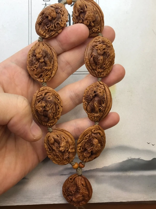 桃核手工雕刻老虎手持