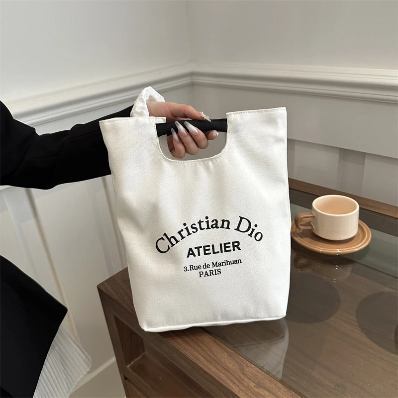 手拎外出文艺帆布上班化妆妈咪包学生饭盒袋手提水桶便当休闲布包