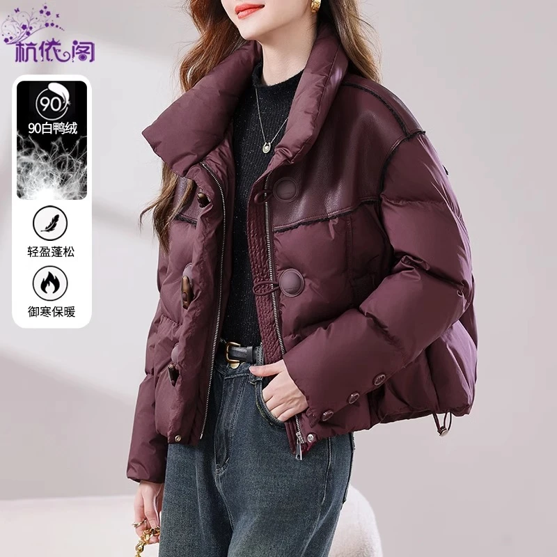 PU皮拼接羽绒服女短款2025新款冬季高端时尚洋气牛角扣白鸭绒外套