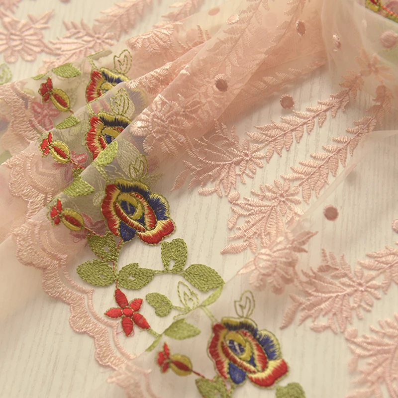 米黄色单边定位绣花提花网纱布 婚纱小礼服装饰连衣裙子民族面料