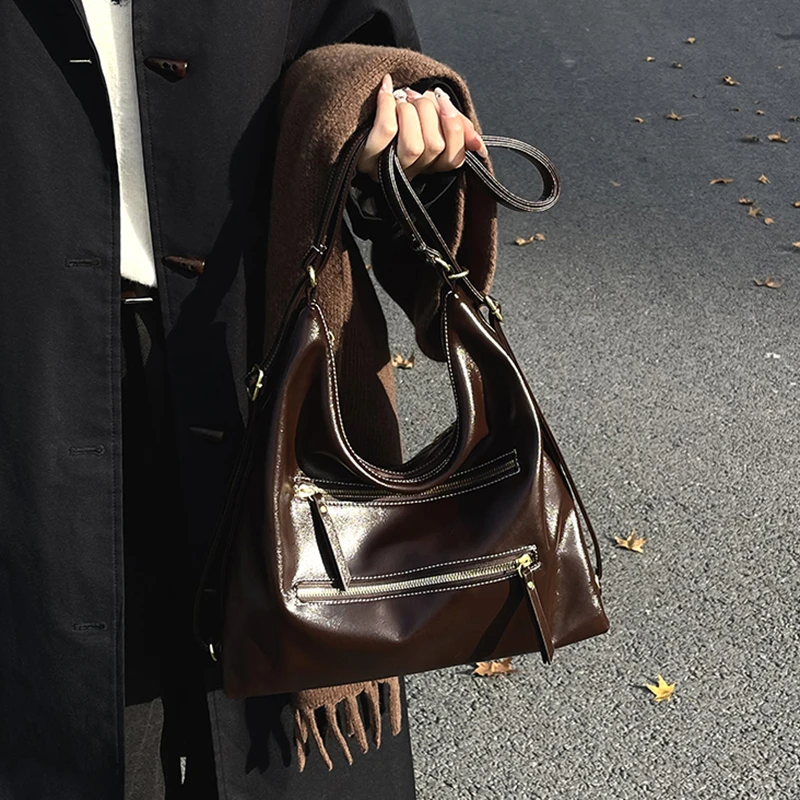 秋冬新款大容量油皮三背托特包女学生早八通勤包百搭单肩包斜挎包