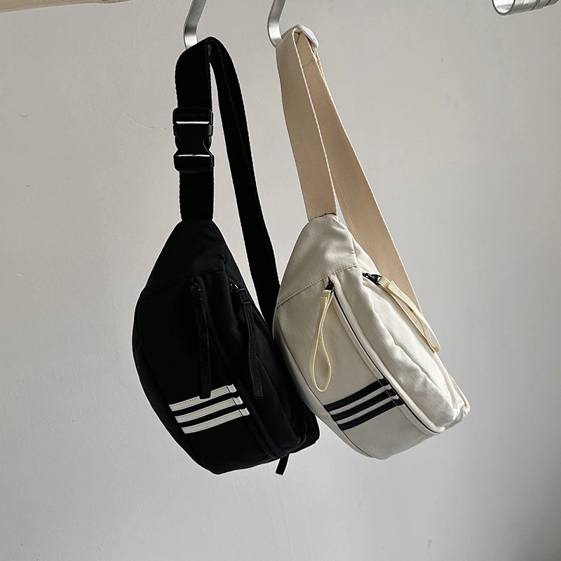 秋冬休闲运动胸包百搭帆布包包女士2023新款潮大容量斜挎男生腰包