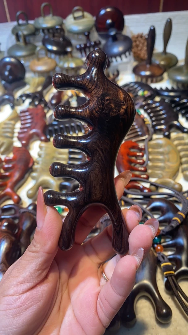 紫光檀大白鲟按摩梳多功能便携家用防静电