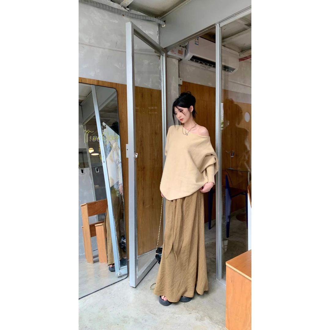 2428319时尚休闲显瘦遮肉气质宽松针织上衣加休闲半身裙套装