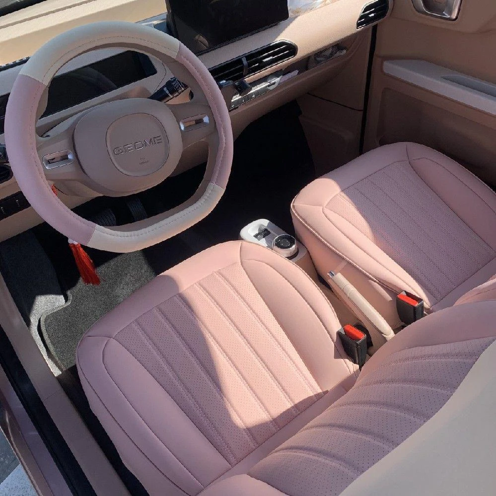 吉利熊猫MINI专用汽车方向盘套网红女神透气防滑把套汽车头枕腰枕