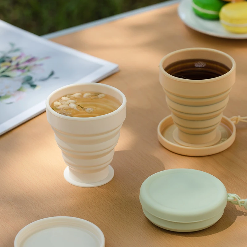 新疆包邮硅胶挂绳折叠杯差旅便携压缩杯子露营儿童漱口可伸缩水杯