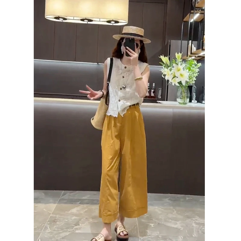 2024年夏季新款气质蕾丝镂空坎肩单排扣上衣+百搭纯色休闲裤套装