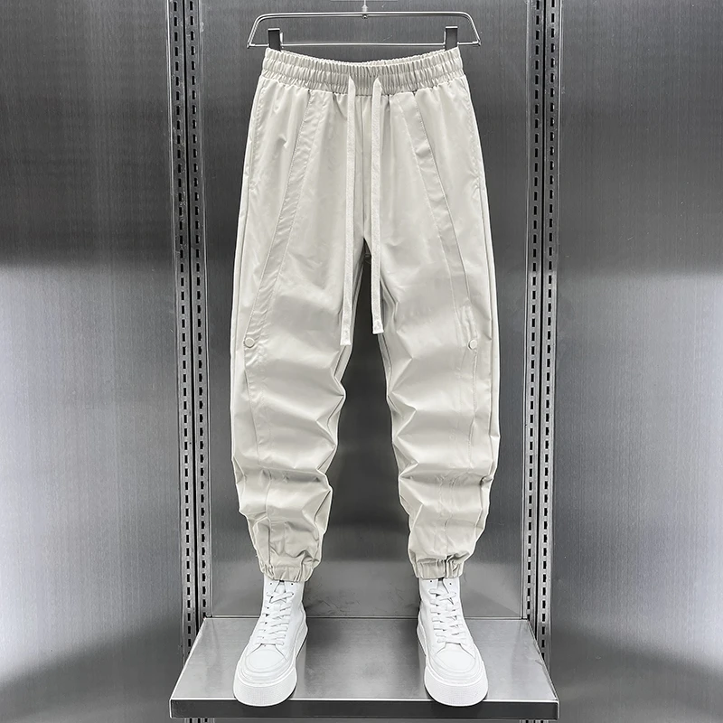 休闲裤男士秋冬新款小众高级感拼接运动裤潮流宽松束脚哈伦九分裤