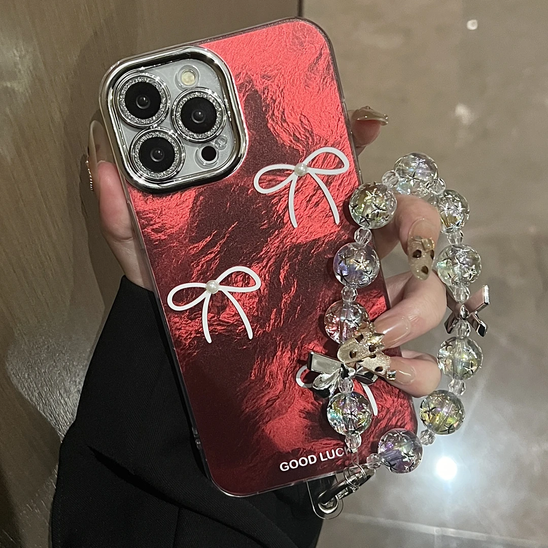 镜头膜立体珍珠蝴蝶结苹果16手机壳适用15promax气质14挂链13电镀