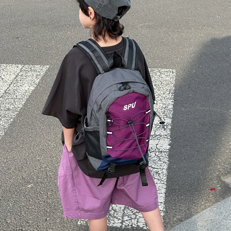 儿童抽绳复古户外运动背包男孩拼色百搭双肩包幼儿园时尚休闲书包