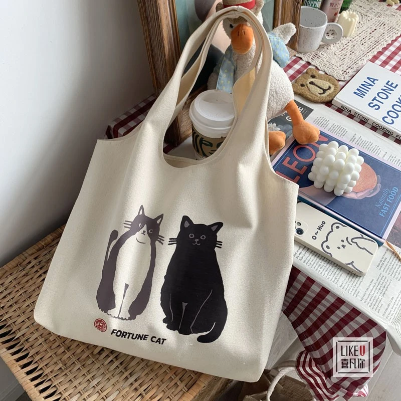 2025原创设计可爱猫咪手绘插画单肩包书包文艺复古大容量帆布包女