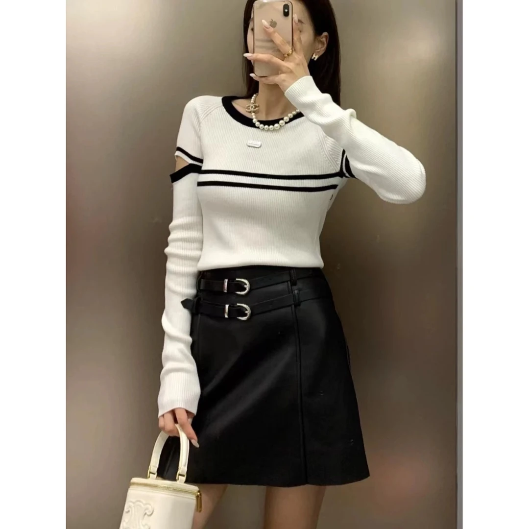 慵懒风安哥拉红秋冬新款条纹针织衫毛衣女显瘦韩版镂空撞色打底衫