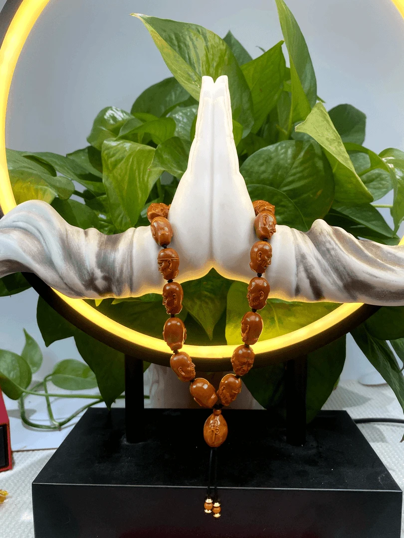 锦和，三藏归渔橄榄核雕手持5