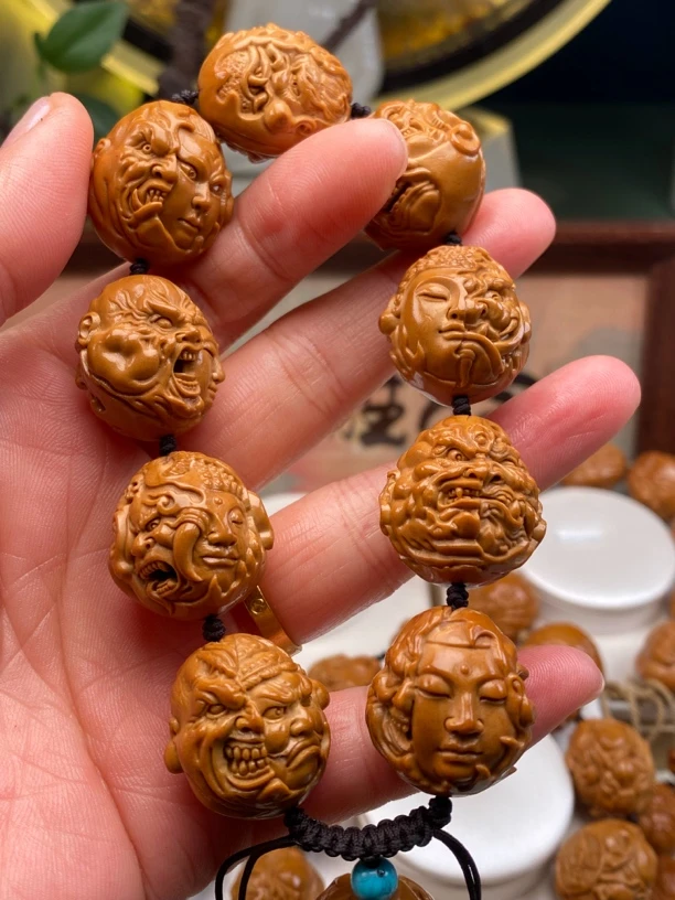 2.1天神四面恶僧雕刻文玩核桃手串