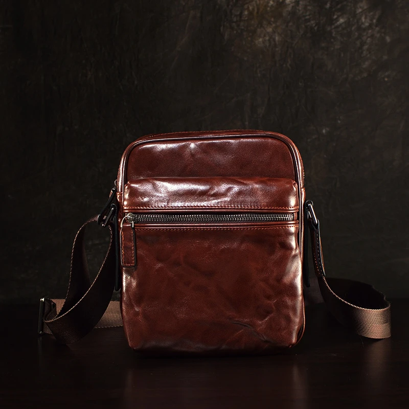 真皮斜挎包男士包时尚肩包复古休闲韩版潮流竖款百搭简约邮差个性