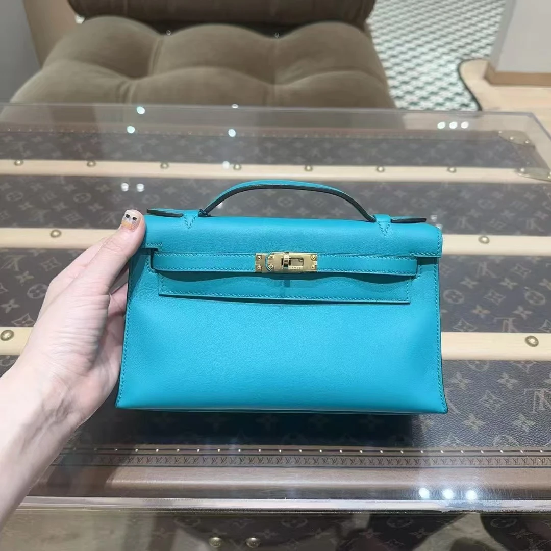99新 Hermes/爱马仕 0011/miniKelly一代 7f孔雀蓝Swfie皮金扣