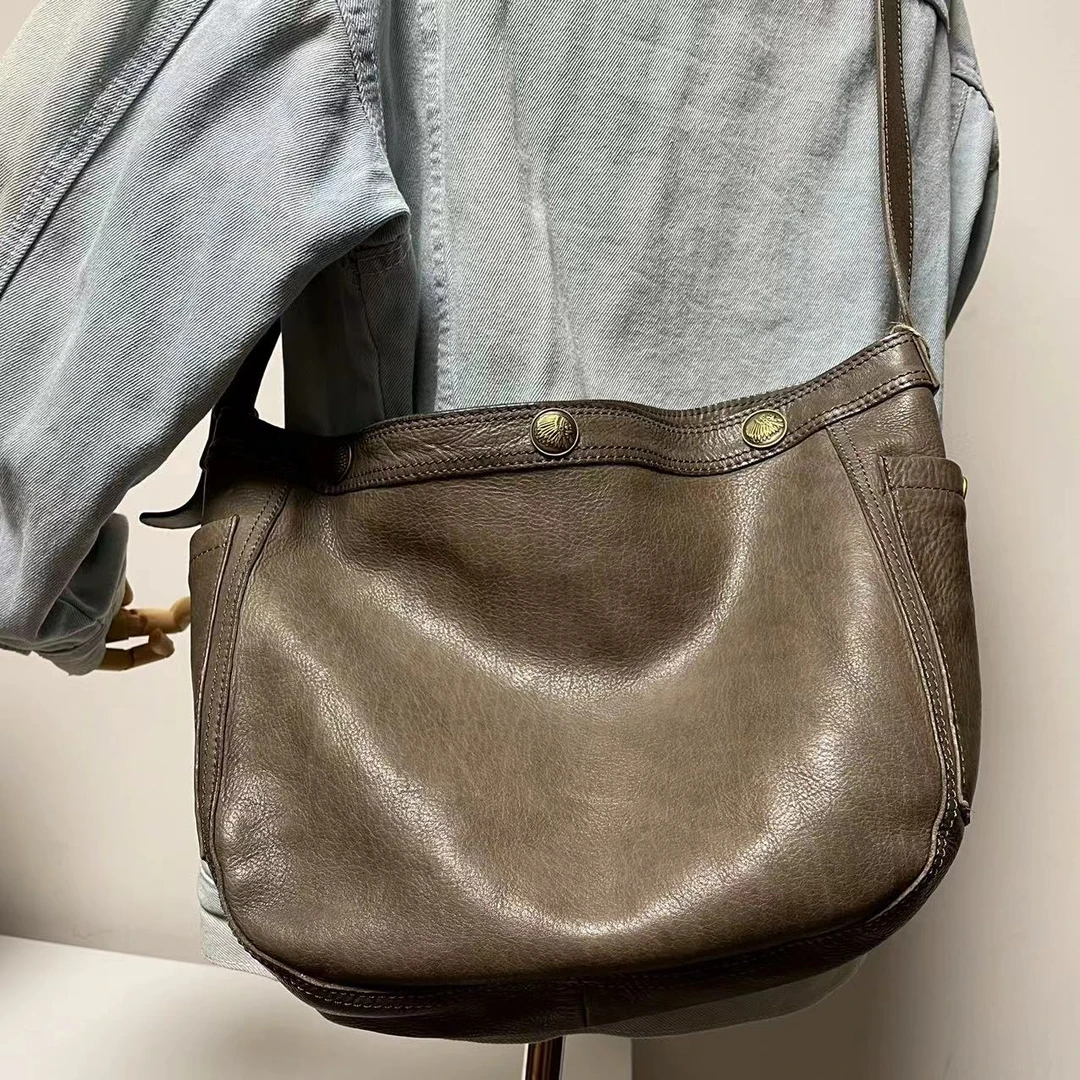 新款2024时尚百搭法拉利胎牛皮单肩斜背饺子包