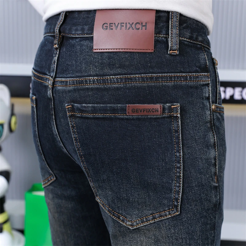 秋冬欧货高端怀旧复古深蓝男士牛仔裤新款弹力小直筒百搭九分长裤