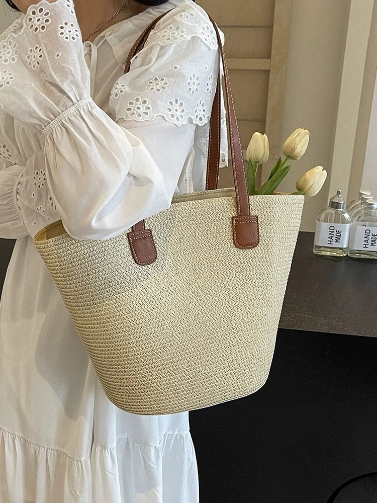 纯色草编大容量托特包海边休闲度假女新款撞色水桶包小众单肩包