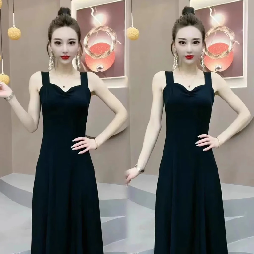 赫本风简约黑色吊带裙2025夏新款时尚百搭收腰显瘦气质连衣长裙
