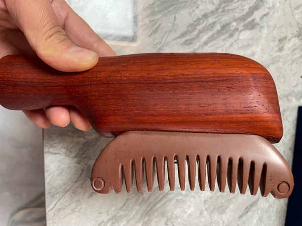 泗滨砭石电加热梳子