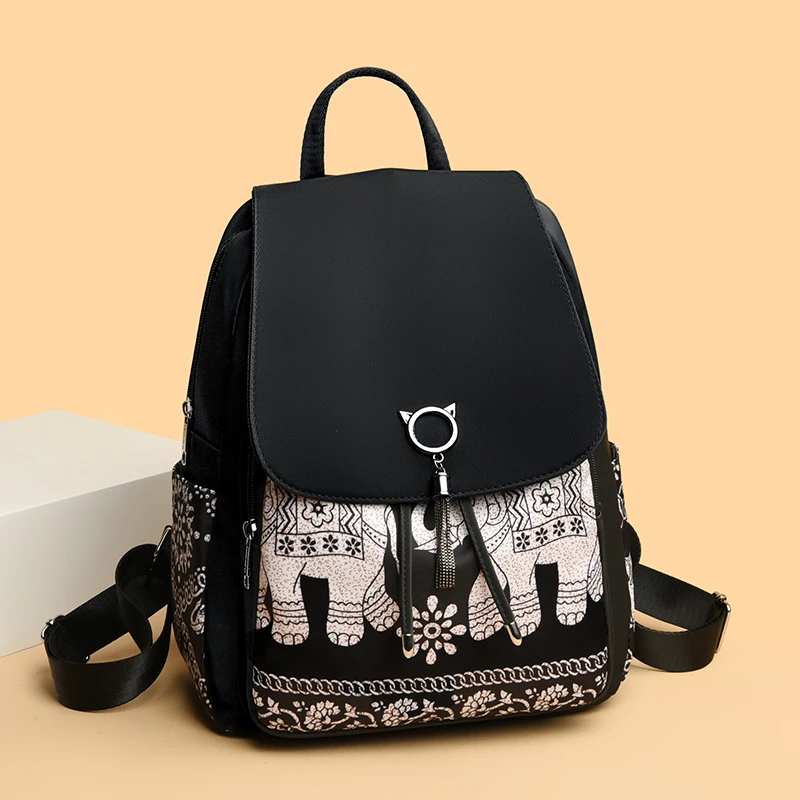 米琦袋鼠中年女士简约轻便大容量旅行背包2025新款大气时尚双肩包