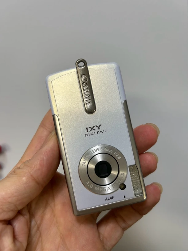 95新 Canon/佳能 佳能ixyl1浅紫白摄影经典复古自拍数码相机照相