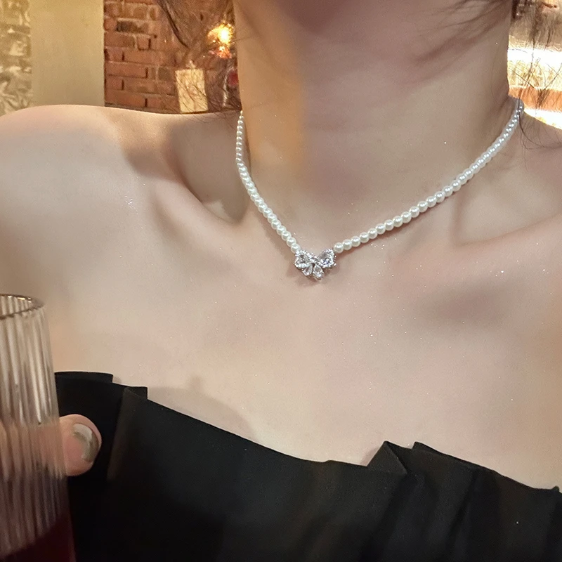 oushipei/欧诗佩 铜合金仿珍珠项链 温柔蝴蝶结锆石项链锁骨链女