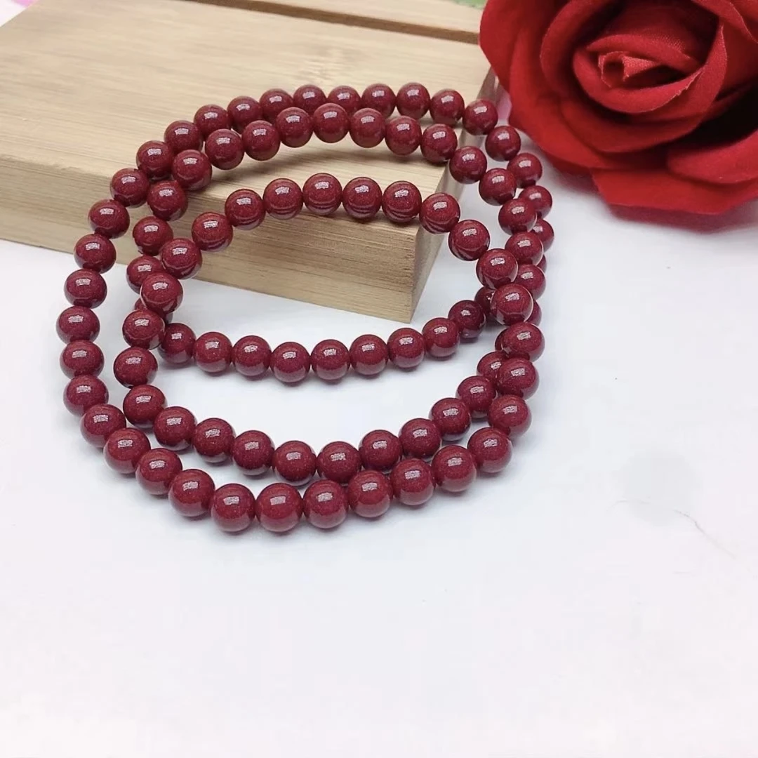 含辰砂工艺品含辰砂工艺品55紫金色三圈手链