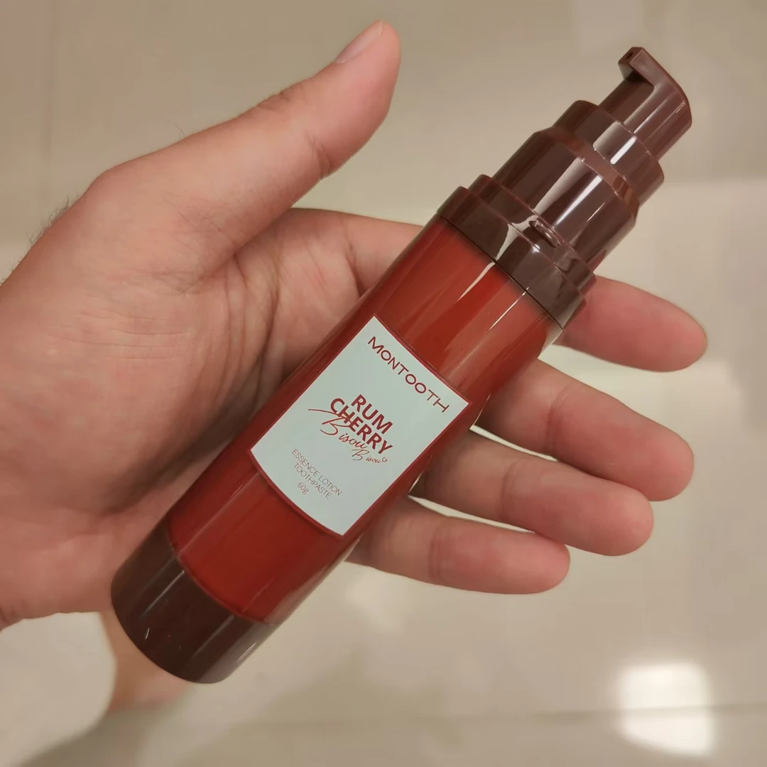 萌洁齿精华乳液牙膏60g。