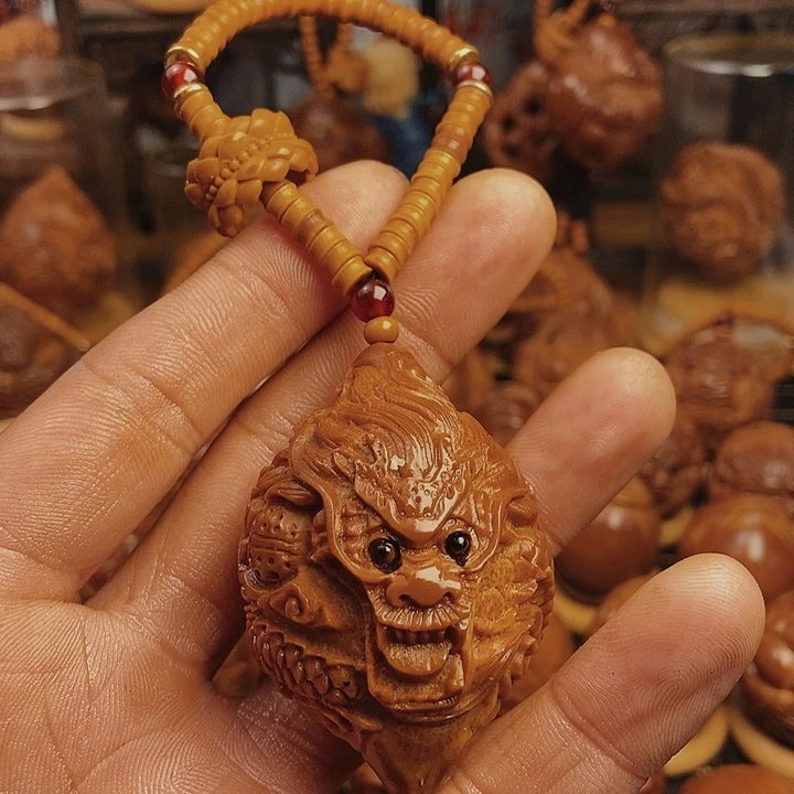 橄榄核核雕张**彩橄榄龙