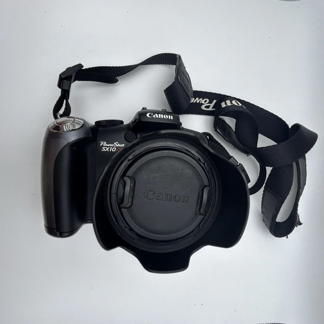 99新 Canon/佳能 佳能SX10IS翻转屏可自拍可拍月亮演唱会电池盖锈