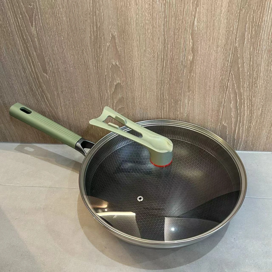 【高货】食品级不锈钢蜂窝防烫绿色手柄轻奢家庭炒锅煎蛋炉灶通用