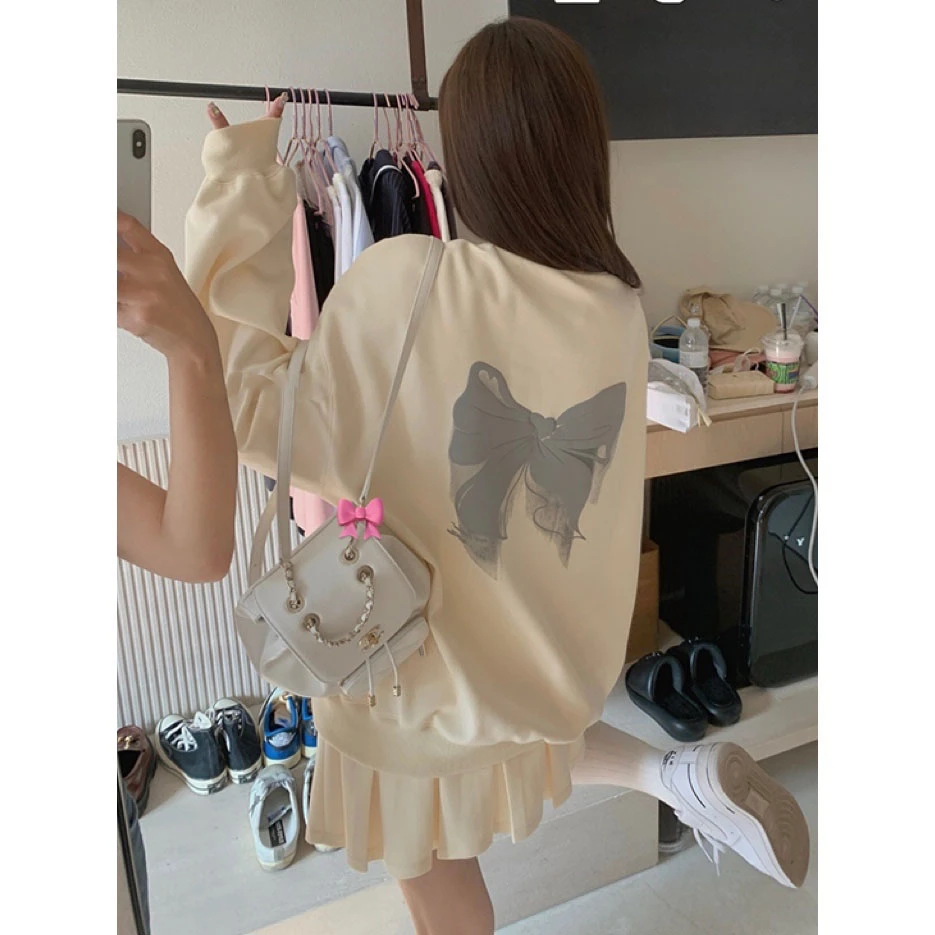 时尚休闲韩版蝴蝶结印花卫衣女宽松显瘦圆领上衣配高腰百褶裙套装