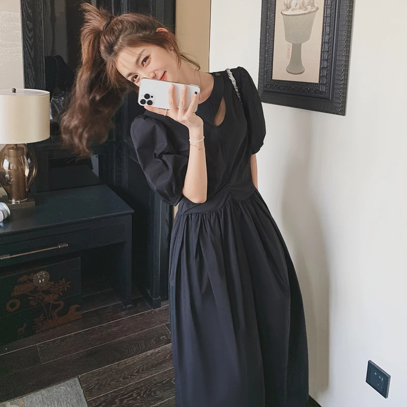 超好看黑色连衣裙女2025新款夏季设计感小个子气质休闲收腰中长裙