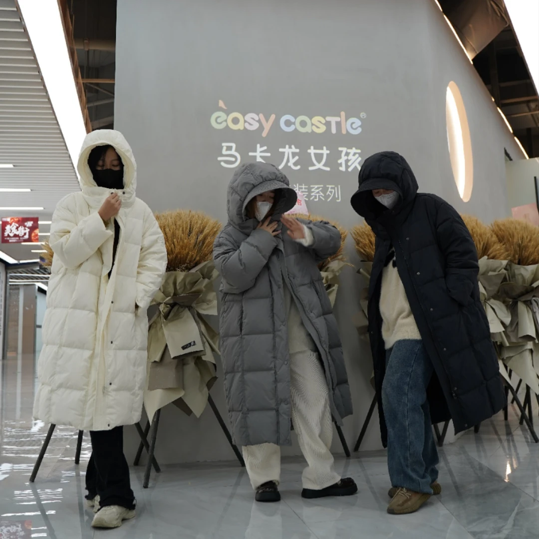 秋冬新款羽绒服女花苞连帽长款过膝加厚宽松直筒白鸭绒外套
