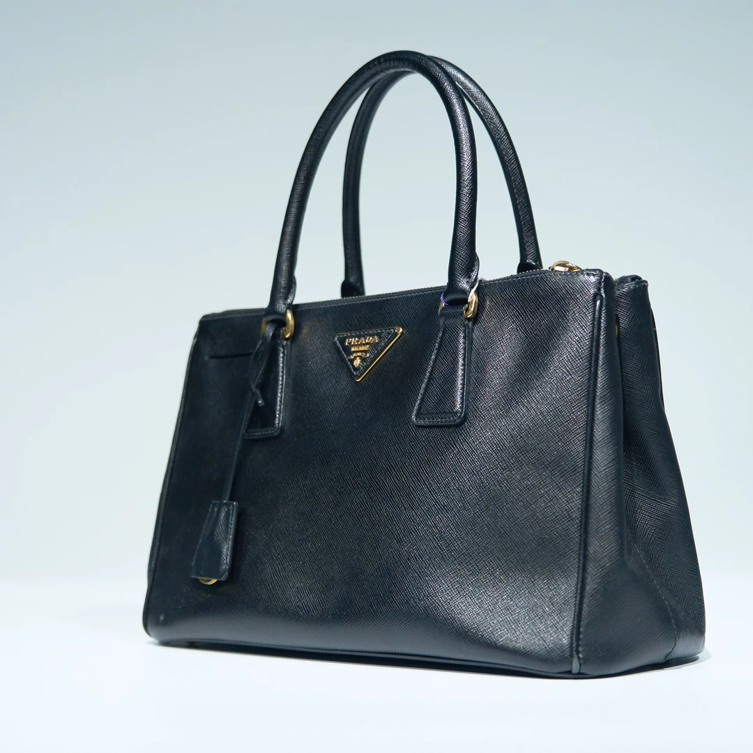99新 Prada/普拉达  Prada杀手小号双拉链黑色包/0620023